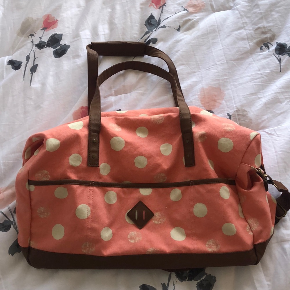 Pink polka dot weekender bag